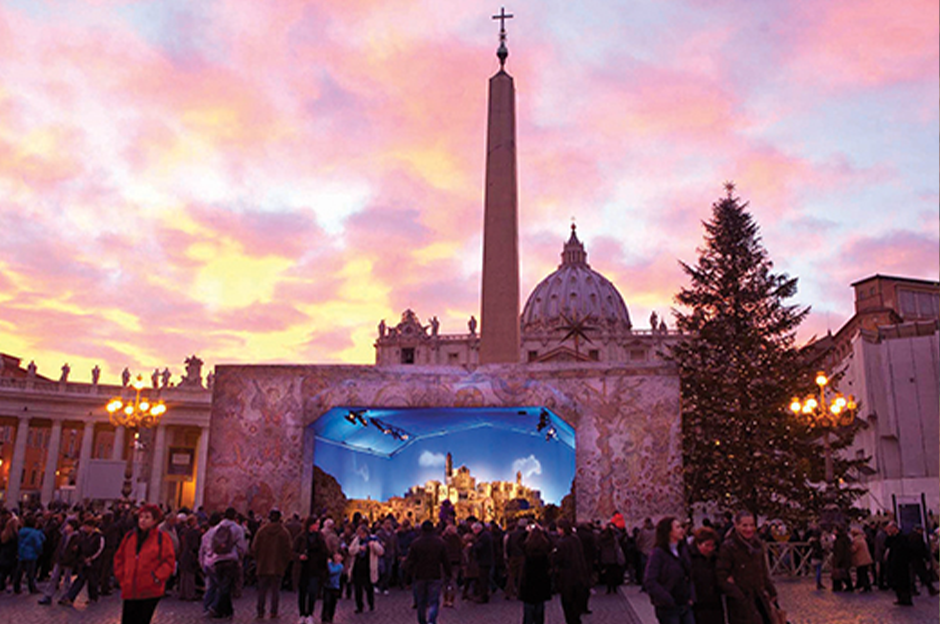 Margot Balboni, Piazza San Pietro, Vatican City, 2012 Sassi of Matera presepe by Francesco Artese.   Each year the Vatican erects a large presepe in Piazza San Pietro that is revealed with great fanfare and excitement on Christmas Eve. In 2012 the Nativity was donated to the Vatican by Basilicata who commissioned artist Francesco Artese to create a nativity scene inspired by the Sassi of Matera, an ancient town in Basilicata, a region in Southern Italy.