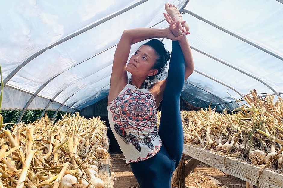 woman in yoga pose, man hue duong yoga shala