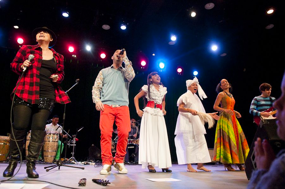 group of people on stage performing