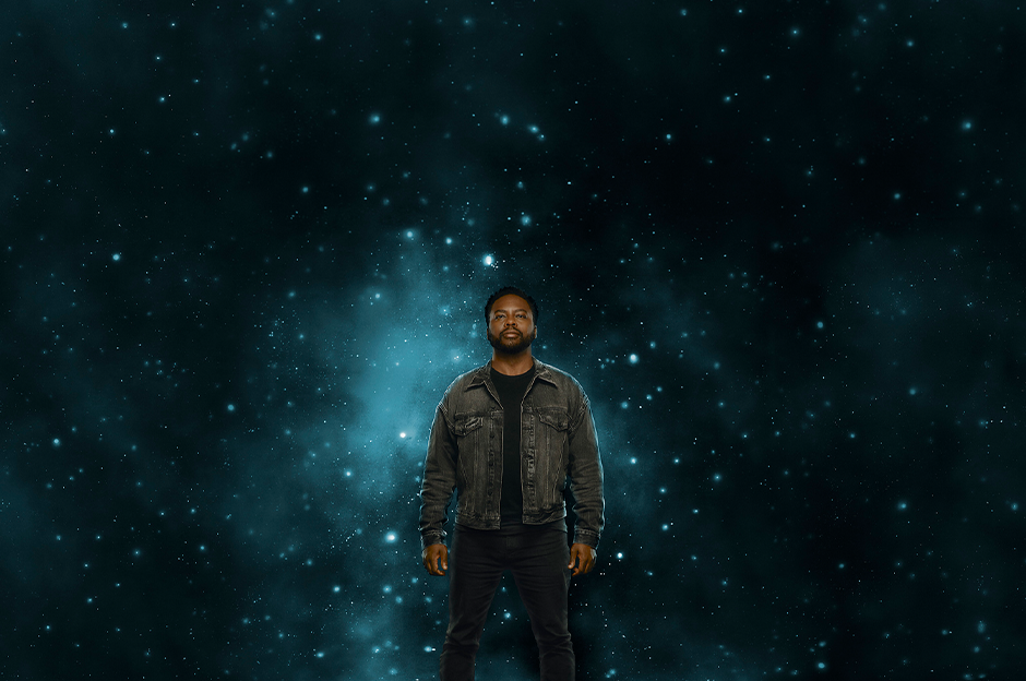 man standing in universe background