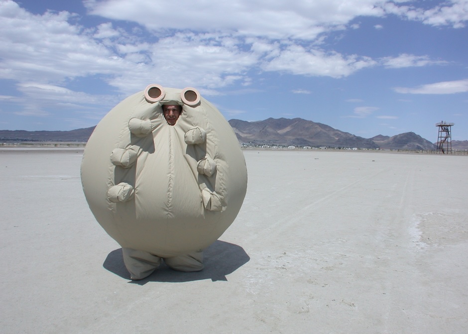 artwork by igor vamos round ball inflated costume in the desert