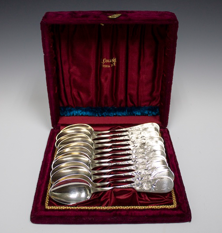red velvet box with silver spoons