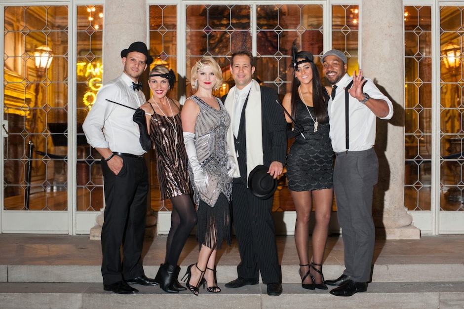 people dressed in flapper costumes