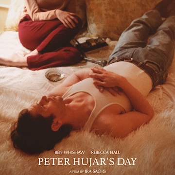 man laying on bed with ash tray