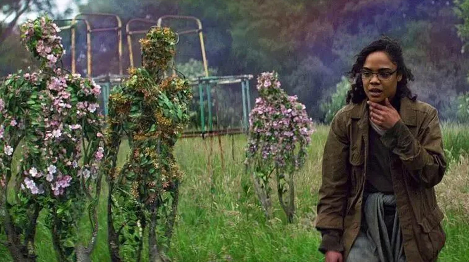 Scientist walking by flower remains of human forms