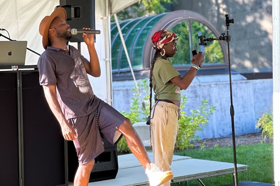 person on stage singing