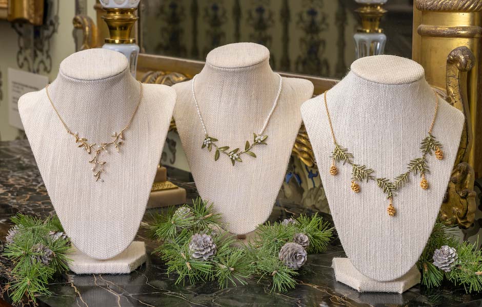 necklaces with pearl, pine cones and branches