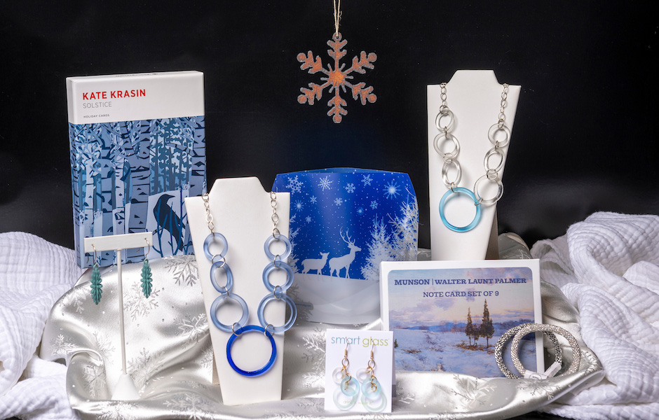 lantern, cards, jewelry all in blue and white with snowflakes