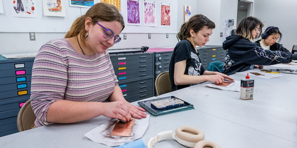 people making prints in classroom