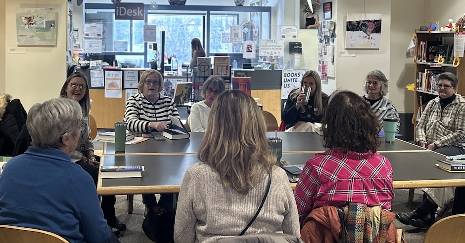 people together reading at book club